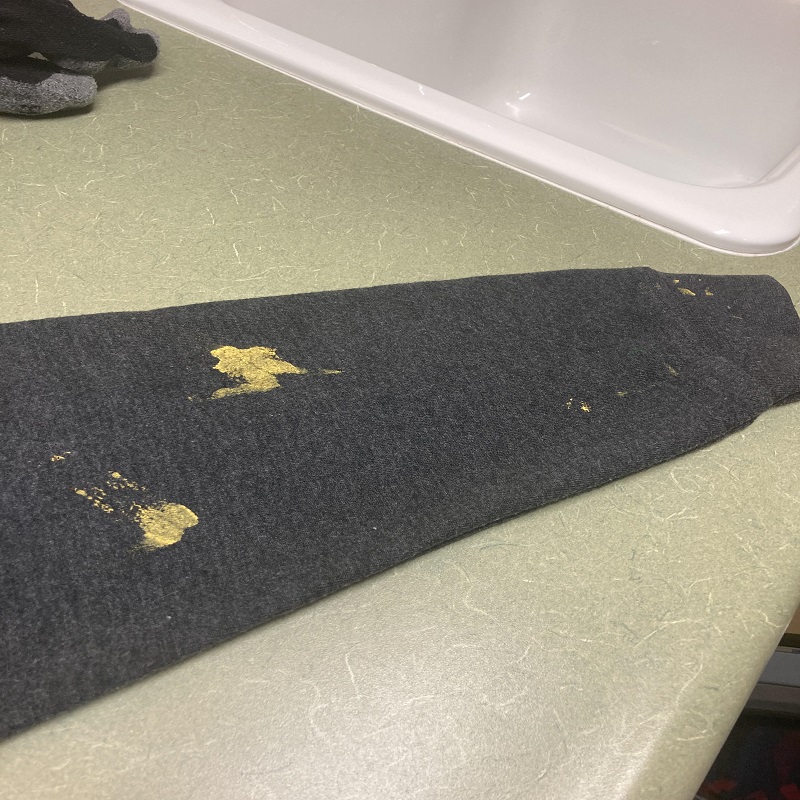 get washable paint out of clothes